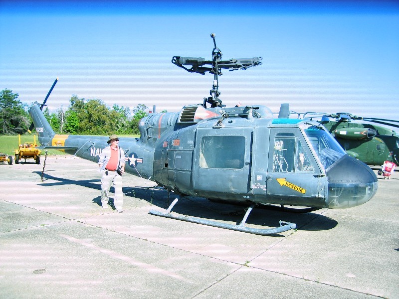 Mark checks out a Huey like he worked on in Viet Nam.