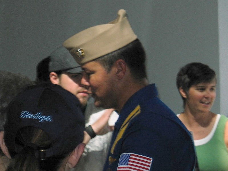 One of the Blue Angles, a sharp good looking guy signing autographs.
