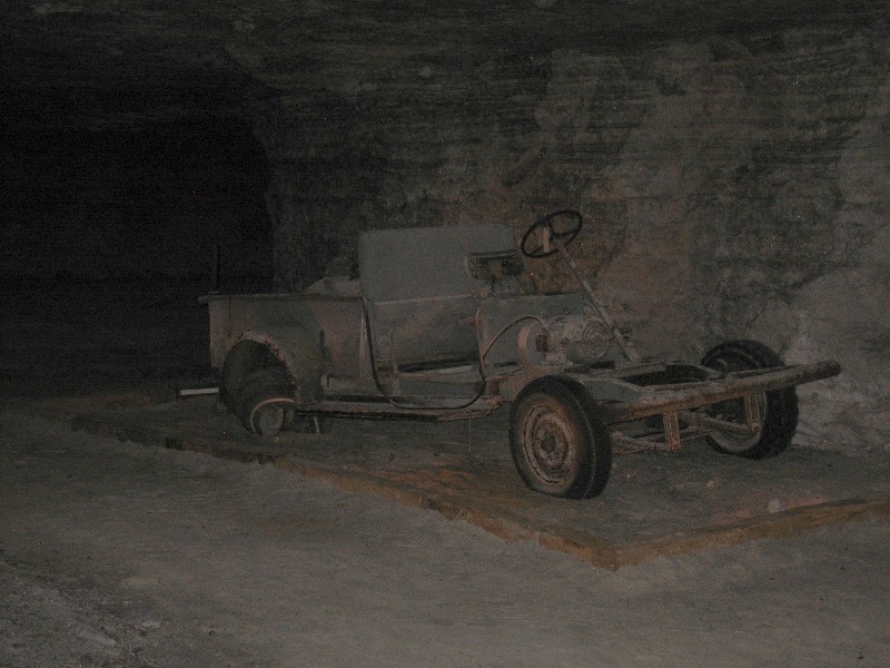Old vehicles are brought down in sections and then converted to electric motors for transportation in the mine. 