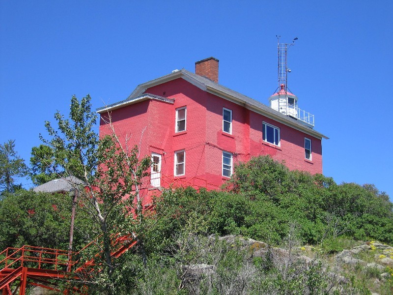 The is the Marquette Lighthouse. It housed two lighthouse tending families. It is still an active lighthouse. The Coast Guard manages the light, the Marquette Maritime Museum is restoring the lighthouse and gives tours. 