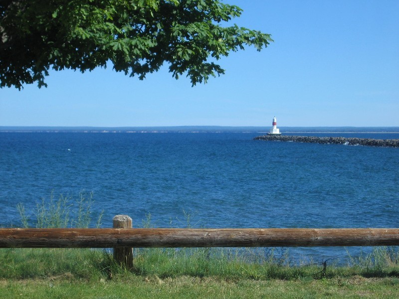 Note the train ore cars on top. The cars are placed ontop, the load is dumped into hoppers in the Dock. Then chutes are lowered into the ore carrier ships to lade the ore. 