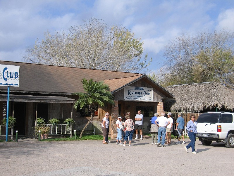 The gang begins to arrive at the Riverside Club.
