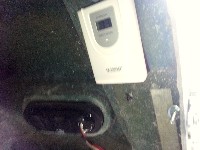 Clock's remote temperature sensor in front cap